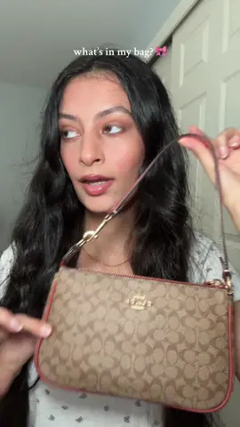 #whatsinmybag #hiBritishvogue #coachgirly #aesthetic #coachpurse @Coach @Rare Beauty @Burberry @Bath & Body Works @Tower 28 Beauty @elfcosmetics 