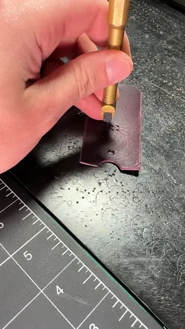Punching stitching holes #leathertok #leather #edc #leatherstitching #leatherasmr #leathergoods #leathertokleathercraft #leathertiktok #leatherworkshop #oddlysatisfying 