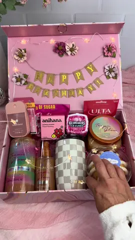 Light Up Birthday Box ✨ Unboxing the ultimate birthday surprise box.  This will definitely light up their special day!  For about the same price of a gift bag, I found this adorable box at @homegoods.  I then used the cake topper happy birthday banner and flower string lights from @partycity along with faux flowers to decorate the inside lid of the box.  Lastly, I filled it with pampering items, candy, tumbler, gift card, and even a mini Bundt cake!  Her face when she opened it was priceless! #birthdaybox #surprisegiftbox #surprisegifts #birthdaygiftideas #birthdaygiftideasforher #giftideasforher #birthdaygirl #diygifts 