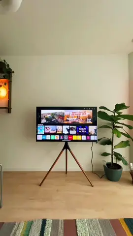 Ever notice how fancy homes always try to hide their TVs? 3 reasons I opted for a tripod tv stand over a TV console: 1. Saves space. 2. Easily rotate the tv to watch from different angles. 3. Makes the tv setup sleek.