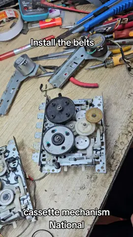 Install the belts on National cassette mechanism #restoration #repair #cassette #cassettetape 