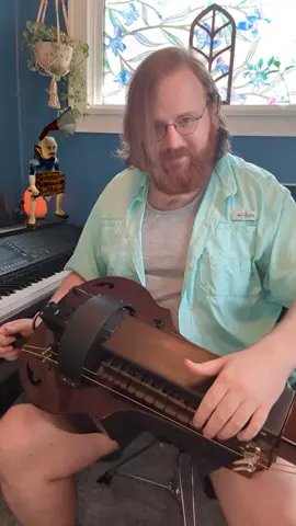 A little #songofstorms from #ocarinaoftime! I guess it actually works cause this evening we got a hell of a storm here in #Minnesota 😂 Don't mind my little friend in the background. Youtube: https://www.youtube.com/@m00glemuffins Twitch: https://twitch.tv/m00glemuffins #hurdygurdy #legendofzelda #folk #hurdygurdytiktok #tunesday #hurdygurdyplayer