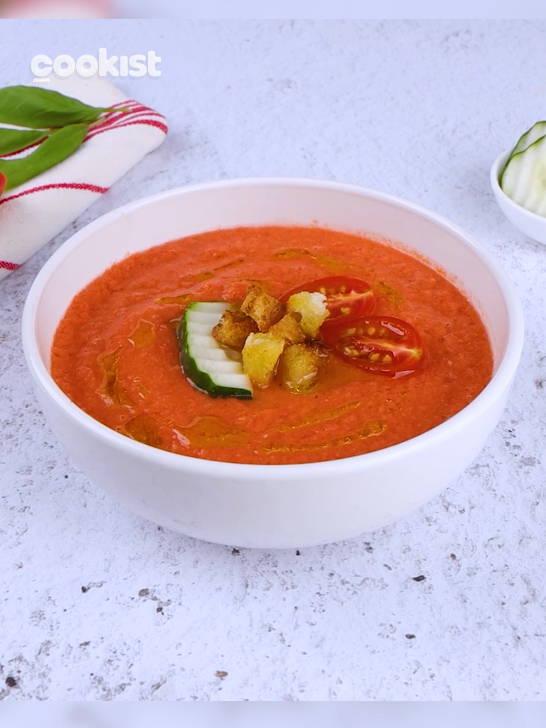 If you've never tried, you're gonna LOVE it 😍 Here's how to make GAZPACHO! 🇪🇸💃🏻 The original recipe: 👉INGREDIENTS 2 slices of bread Water 30ml (2 tbsp) of white vinegar 2 bell peppers 4 tomatoes 1/2 cucumber 1 onion Olive oil Salt Pepper 👉METHOD 1. In a small bowl add the bread slices and pour the water and white vinegar. Set aside. 2. Slice the peppers, tomatoes, cucumber, and onion and set aside. 3. In a blender add the vegetables and mix. Add the bread, olive oil, salt, and pepper and continue with mixing to combine all well. 4. Pour the gazpacho into the bowls and decorate with the vegetables and croutons. Add a drizzle of olive oil and serve. Have you ever tried it? Let us know in the comments 👇 #cookistwow #cookistrecipe #easy #fun #quick #spanishrecipe #spain #gazpacho  #cookistwow