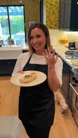 I said yes! 💍 Next up on ✨Cooking with Demi✨ is one of my favorites - Marry Me Chicken.  Recipe by @Diana | Little Sunny Kitchen and special appearance by @jutes 👀🖤 INGREDIENTS: 3 large chicken breasts boneless and skinless, sliced lengthwise into thin cutlets ½ teaspoon salt ¼ teaspoon ground black pepper 6 tablespoons all-purpose flour 2 tablespoons olive oil 2 tablespoons unsalted butter 3 cloves garlic minced 1 cup chicken stock 1 cup heavy cream ½ cup parmesan cheese grated 1 teaspoon chili flakes ¼ teaspoon oregano ¼ teaspoon thyme ⅓ cup sun-dried tomatoes chopped 1 tablespoon fresh basil leaves