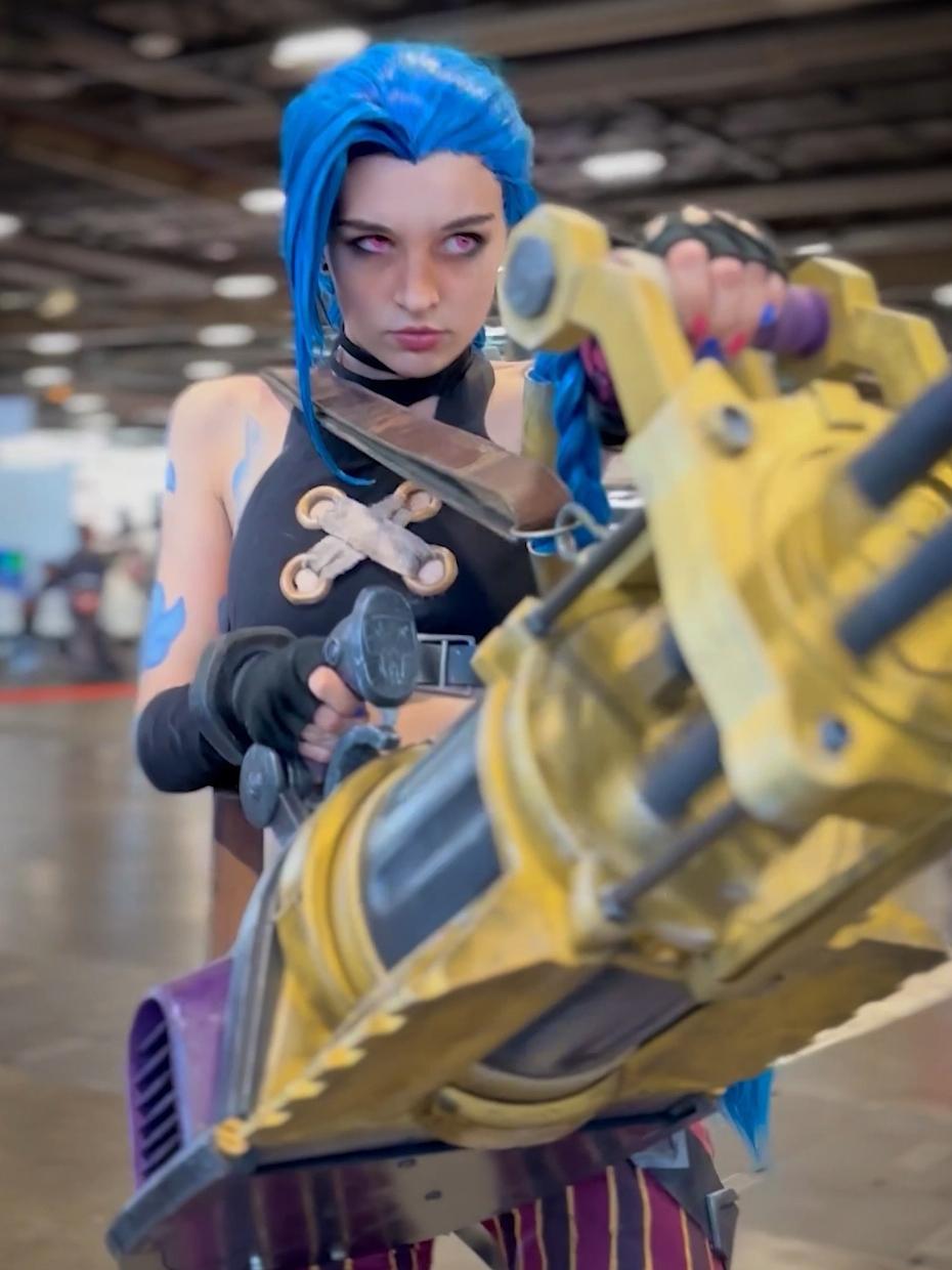 Jinx cosplay from Arcane League of Legends, recorded at Japan Expo Paris 2024 by Comic Con News Jinx is a chaotic and unpredictable champion from League of Legends by Riot Games, playing a central role in the animated series Arcane. Known for her wild antics and destructive tendencies, she is iconic in the LoL community.  In Arcane, the song 