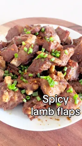 Stew lamb flap.  🧆🥩🌶️Easy recipe.  Tender, spicy and tasty lamb flap Ingredient 800g Lamb flap 1 small onion  2 cloves garlic  3 slices ginger 1tsp cumin powder, pepper powder, paprika, cinnamon powder, sugar  2tsp salt  2tsp chilli powder green onion for garnish  Method Put chopped lamb flap in a pot and marinate in all ingredients (use 1tsp chill powder) for 2 hours.  Add 1cup of water (or beef stock), just cover the meat. Boil for 5 minutes, then turn the heat down, simmer for 2 hours or until the meat tender.  Uncover the lid, turn the heat up and cook to reduce the liquid to get thickened sauce.  Finish with extra chilli powder and green onion. Enjoy. #stew #easy #Recipe #lamb #dinner #food #homecooking 