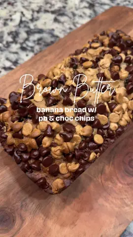 Brown Butter Banana Bread w/ pb & choc chippies 🍌 🍫  INGREDIENTS: - 1/2 cup unsalted butter - 1 cup brown sugar - 3 mashed overripe bananas - 1 egg - 1 teaspoon vanilla extract - 2 cups flour - 1 teaspoon baking soda - 1/4 teaspoon salt - 1 cup semi-sweet chocolate chips - 1 cup Peanut butter chips  DIRECTIONS:  1. ﻿﻿﻿Pre-heat the oven to 350°F. 2. ﻿﻿﻿In a saucepan over medium-low heat, add in the unsalted butter. Allow the butter to melt & stir to avoid burning. Allow to cool for 10 minutes. 3. ﻿﻿﻿Whisk in the brown sugar until fully incorporated. 4. ﻿﻿﻿In a separate bowl, mash the overripe bananas. Add the bananas to the butter-sugar mixture. Whisk until fully combined. 5. ﻿﻿﻿Whisk in the egg & vanilla extract. 6. ﻿﻿﻿In a separate bowl, whisk together the flour, baking soda, & salt. 7. ﻿﻿﻿Pour the flour mixture into the banana batter. Gently fold to combine. 8. ﻿﻿﻿Add in the chocolate chips & pb chips 9. ﻿﻿﻿Pour your mixture into a lined or greased bread pan. 10. Add extra chips to top 11. ﻿﻿﻿﻿Bake the bread at 350° got 55-65 minutes. 12. ﻿﻿﻿﻿Allow the bread to cool at least one hour #bananabread #baking #fallbaking #brownbutterbananabread #brownbutter 
