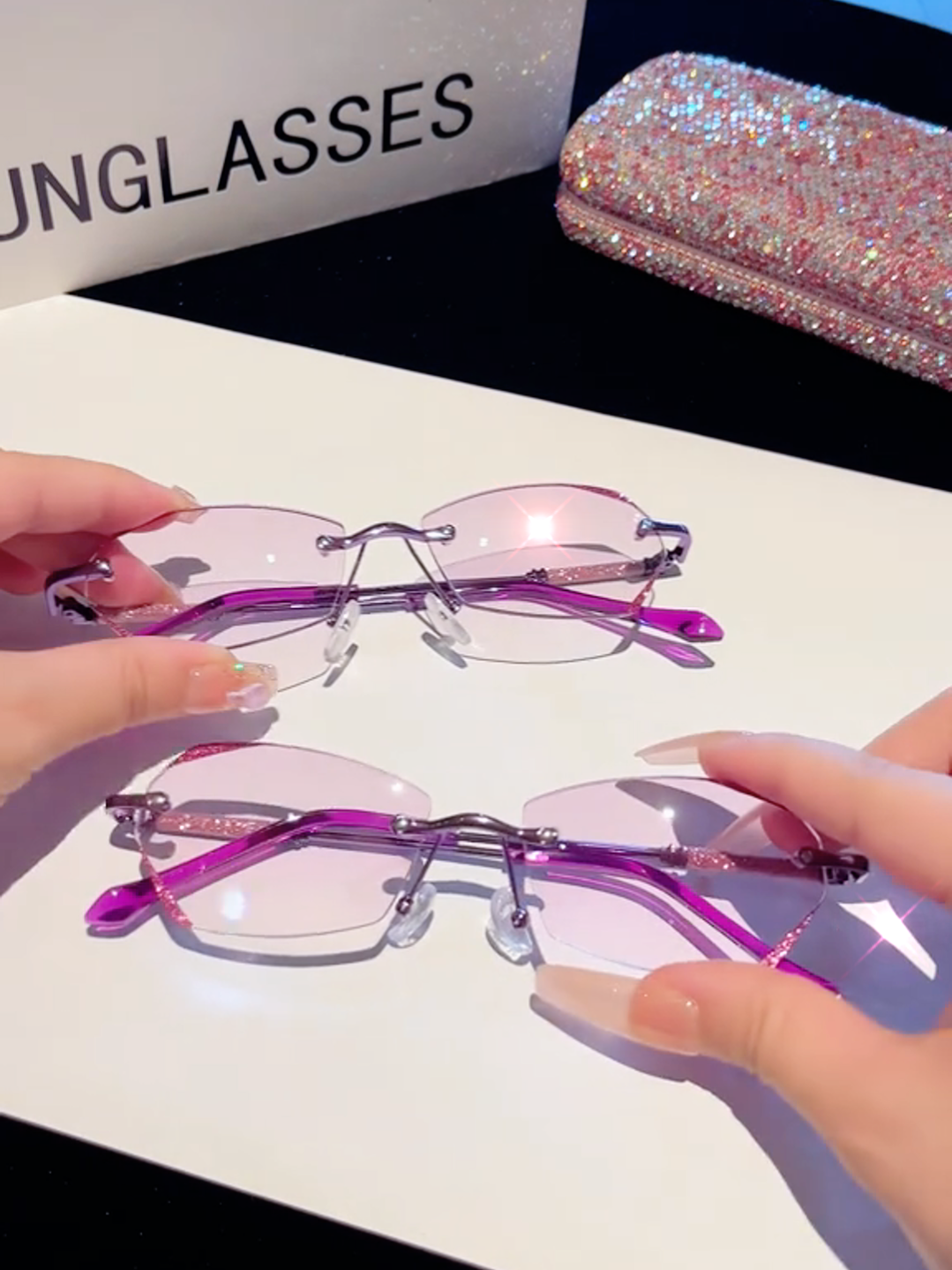 Reading in style? Yes, please! 😍💫 These shiny-rimmed glasses add a little sparkle to your everyday routine. ✨📚#glasses #glassesareamazing #women #reading #newspaper #Outdoors #book #mobilephone