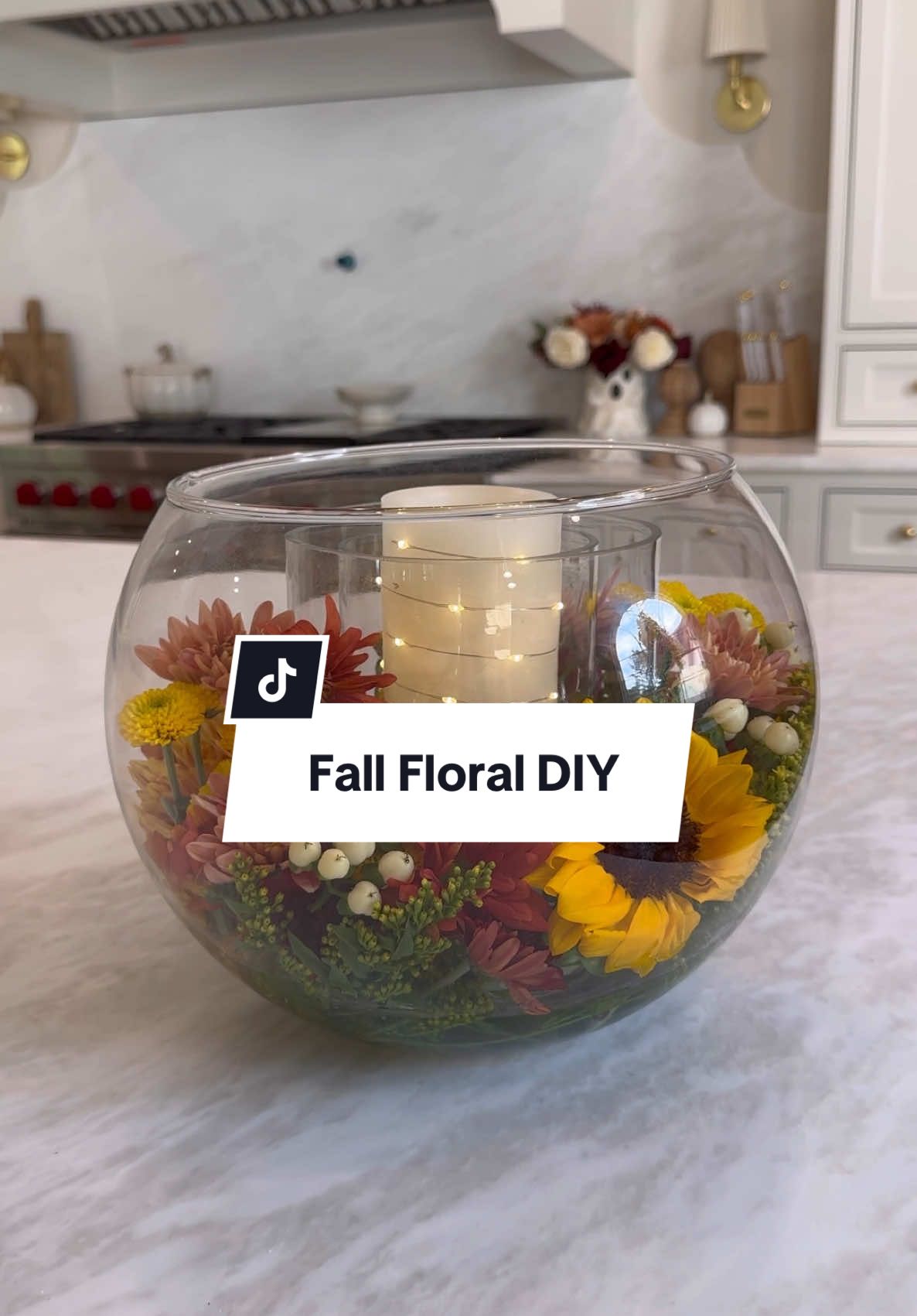 🍂Fall Floral Arrangement🍂 comment SHOP to get the info to shop straight to your inbox. Fall florals are my absolutely favorite! I love the colors and they just create such a warm and cozy feel to any space. I love adding them to this round vase and adding a candle in the middle! #fall #fallseason #fallaesthetic #fallvibes #falldecor #falldecorating #falldiy #diyfalldecorations 