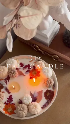 making a diy fall candle 🍂🍁 it looks like a little pumpkin patch 🥹🎃 #fallcandle #fallcandles #fall #candlemaking #falldiy #diycandle #diyfalldecor #falldecor #candlediy #fallaesthetic #asmr #asmrcandles #candletok #cozy #pumpkinseason #pumpkinspice 