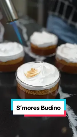 How to make a s’mores chocolate budino 🍫  I like to stir in @Isopure Low Carb Chocolate Protein for added nutrients and protein into the base. #ad  Ingredients: 1. 5 large egg yolks  2. 2 cups heavy cream  3. 1/4 cup sugar of choice  4. 1/4 tsp salt 5. 1 cup semi sweet chocolate chips  6. 2 scoops @isopurecompany Low Carb Chocolate Protein Powder  Graham Cracker Topping: 1. 2 cups graham cracker crumbs  2. 2 tbsp melted butter 3. 1 tbsp white sugar Meringue topping: 1. 3 egg whites 2. 1/2 teaspoon cream of tartar 3. 3/4 cup caster sugar Instructions: 1. In a pot, whisk the egg yolks together. Add the milk and whisk to combine. Add the sugar and pinch of salt and whisk in. Place over medium heat and whisk continuously until it starts to thicken, around 3-5 minutes. Once it is thick enough to coat a back of the spoon and not move, take it off the heat. Make sure to do this process over medium heat, not high! We don’t want to scramble the eggs, so you must slowly bring them up to temp.  2. Whisk in the chocolate chips and protein powder to combine. 3. Pass the mixture through a fine mesh strainer into a clean bowl. Pour the mixture into 4 oz ramekins and transfer to the fridge. Allow the budinos to set in the fridge for 2-3 hours.  4. For the graham cracker topping, pulse the crackers until smooth then stir in sugar and butter, set aside. 5. For the meringue, boil a pot of water. In a metal bowl, whisk together the egg whites, cream of tartar, and sugar. Hold the bowl over the simmering water and whisk until it has doubled in size and is very frothy. The temperature of the mix should be 160°F. Remove from the heat.  6. With a hand mixer, mix the egg whites for 4-5 minutes until medium peaks and it looks glossy. 7. Assemble the dessert, add a layer of graham cracker crust to the top of the budino, then a layer of meringue. Torch the top of the meringue and then serve! Check out the below link to get Isopure Protein Powder for this delicious recipe! And use code 