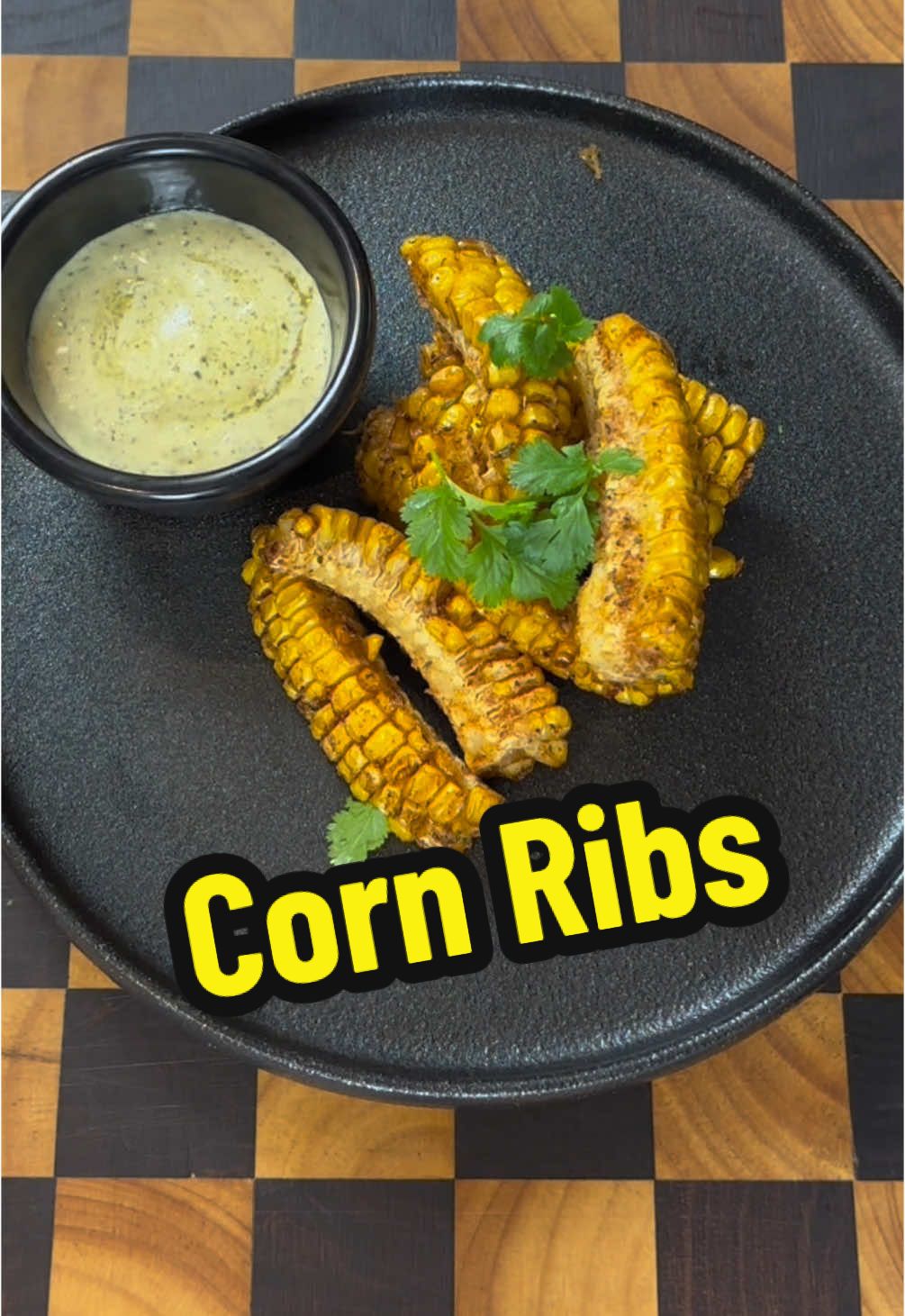 Spice up your snack game with these crispy, zesty corn ribs! 🌽✨ Perfectly deep-fried and seasoned with homemade Peri Peri seasoning and Parmesan, these delicious bites are served with a tangy salsa verde and Kewpie mayo sauce. Easy to make and impossible to resist, they’re the perfect treat for any occasion! Try them out and let me know how you like them! 🙌  Ingredients: 	•	Corn cobs, halved and quartered 	•	Salsa verde (from a previous cook) 	•	Kewpie mayonnaise 	•	Homemade Peri Peri seasoning 	•	Grated Parmesan cheese For Serving: 	•	Extra salsa verde and Kewpie mayonnaise sauce 	•	Fresh herbs (like cilantro) for garnish Recipe: 	1.	Prep the Corn: Halve each corn cob, then quarter them lengthwise to create rib-like pieces. 	2.	Mix the Sauce: Combine salsa verde and Kewpie mayonnaise in a bowl to create a tangy sauce for the corn. 	3.	Deep Fry the Corn: Heat oil to 180°C (356°F) in a deep fryer or pot. Deep fry the corn ribs until golden and crispy. 	4.	Season and Serve: Remove the corn ribs from the oil and place them in a bowl. Immediately season with homemade Peri Peri seasoning and grated Parmesan cheese while they’re hot. 	5.	Plate and Garnish: Serve the corn ribs with extra salsa verde and Kewpie mayonnaise sauce on the side. Garnish with fresh herbs if desired. Hashtags: #CornRibs #DeepFriedGoodness #ZestyFlavors #SnackTime #FoodieFavorites #HomeCooking #EasyRecipe #FlavorExplosion #DeliciousBites #CrispySnacks #SalsaVerde #PeriPeriSeasoning #ParmesanLovers #QuickBites #CornOnTheCob #FoodInspo #CookingAtHome #TasteOfSummer #CornLovers #KewpieMayo #FriedCorn #CrunchySnack #FoodieGram #FoodLovers #SpiceItUp