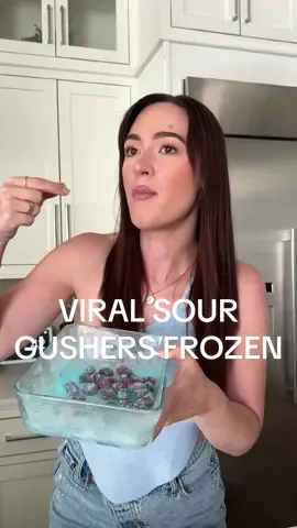 taste testing the VIRAL sour gushers!! but make it frozen ❄️🍬 if you haven’t seen @Remi Cruz video yet, we mixed gushers, baby bottle pop powder, and blue warhead spray!! #tastetest #candy #sour #gushers #food 