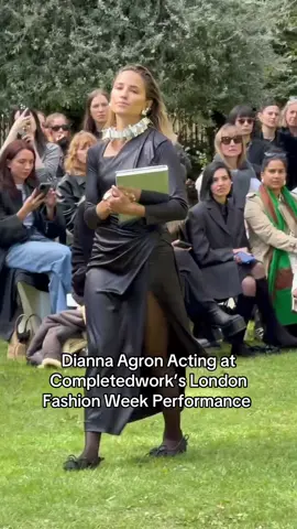 @Completedworks designer Anna Jewsbury managed to capture the attention of an intimate audience for 20 minutes in Gordon Square park in London's Bloomsbury on Friday, and not one pigeon dared to interrupt the performance. Novelist Fatima Farheen Mirza penned a three-act play inspired by the French sculptor Camille Claudel, which actor Dianna Agron read out in the character of a biographer called Eliza, who is having an internal conflict within herself. Other parts of Eliza's monologue were acted out by a violinist and the model Lily Cole. Read about the performance on WWD.com.  Report: @Hikmat Mohammed  Video: Dianna Agron as Eliza via Tianwei Zhang #diannaagron #lfw 