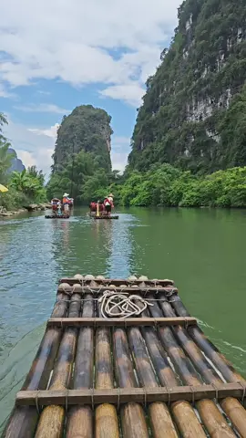 Gliding through the serene stream on a bamboo raft, surrounded by nature’s beauty. The cool breeze and gentle flow make this moment so peaceful 🌿🚣‍♂️ #BambooRafting #SereneScapes #NatureVibes #CoolAdventure #PeacefulJourney #RaftingLife #NatureLovers