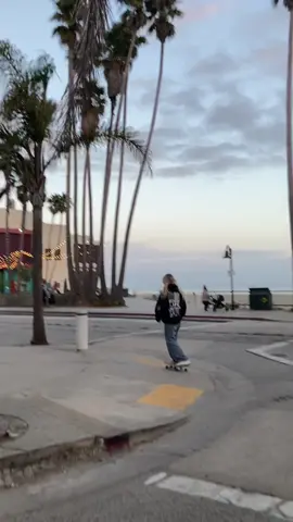 lil hill bomb in santa cruz js messing around and having fun under these perfect clouds and palm trees with that gorgeous ocean view. i couldn’t ask for anything more🩵  (peep the new board)