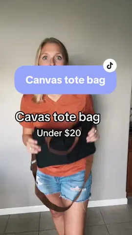 This canvas tote bag is perfect for storing your books or craft supplies! I love the Crossbody design and the leather handle detail. ##BookTok##totebag##canvastotebag##falltrends##giftidea##tiktokshopfinds trending tote bag 2024 tote bag canvas tote bag for school