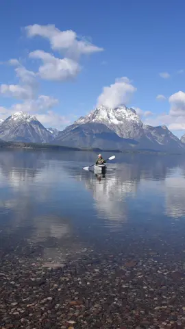 Unforgettable moment! An elk calling in the background as I paddle in Grand Teton National Park! I was the only one on the lake and it was dead quiet except for a few birds but then out of nowhere this incredible elk decided to make its presence known! 🦌🏔️ •  • • #kayaking #paddling #brooklynkayakcompany #catchyournextadventure #kayakingadventures #elk #grandtetonnationalpark