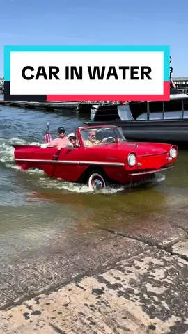 Its an Amphicar!  🚗🚤 Literally drives straight in and out of water.