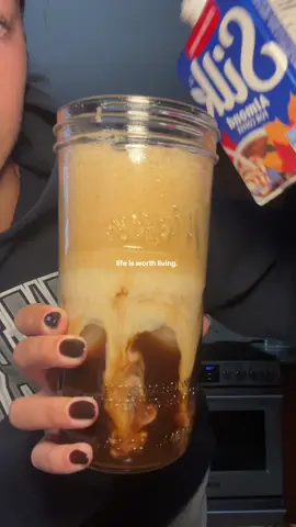 Mastering your at home coffee routine >>> Anyone else obsessed with how pretty it look when milk is poured into coffee or just me?😂😍🫣 #fyp #lifeisworthliving #trending #trendingsound #icedcoffee #homemade #homecafe #coffeeathome #shakenespressorecipe #shakenespresso 