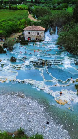 At The Saturnia thermal hot springs, Toscany, Italy, you can enter this big area for free, lie calm in this 37,5 degree Celsius water and relax or take a shower in the waterfall.  .⁣ #swimmingtime #cliffside #saturnia #mediterraneanlife #mediterraneanlifestyle #saturniahotsprings #mediterraneanvibes #toscany #toscana🇮🇹 #droneoftheday #toscana #vacationvibes #relaxing #travelphotography #enjoyingholidays #hotsprings #italianstyle #sceneryphotography #saturniaterme #saturniatoscana #naturalhotsprings #toscanygram #dronevideos #traveldestination #summerstyle #visititaly #visittoscana #italianstyle #toscanalike #dronefilm 