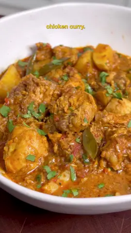 This chicken curry is slightly different from the regular or traditional Sinhalese chicken curry; however, it’s equally good. 👌🏽  I love how the recipe calls for yogurt instead of coconut milk, and the addition of potatoes makes it a perfect weeknight meal with some rice! Sri Lankan Muslim Chicken Curry Chicken Marinade 750g curry-cut chicken  Salt  Juice of 1/3 lime  2 tbsp yogurt  1/3 tsp turmeric  1 tbsp ginger-garlic paste  1 tbsp black pepper powder  2/3 tbsp chili powder  1 tbsp coriander powder  2/3 tbsp roasted curry powder or meat curry powder  3 green chilies, chopped  Curry Base 2 tbsp coconut oil (or more)  1/2 stick of Ceylon cinnamon  2/3 tbsp cumin seeds  3 cardamom pods, crushed  1 large sprig of curry leaves  1.5 large red onions, chopped  4 cloves garlic, chopped  3 green chilies, sliced  1 large tomato, diced  2 large potatoes, diced  Splash of water  Coriander leaves  Instructions 1. Marinate the chicken with the ingredients listed above. Set aside for at least 30 minutes.  2. Heat a pot over medium heat and add the coconut oil. Once the oil is hot, add all the whole spices and curry leaves. Sauté for 10 seconds.  3. Add the onions and continue sautéing for about 3 minutes, until the onions become translucent.  4. Add the garlic and sauté for another 7 minutes.  5. Add the green chilies and tomato. Mix and cook for 5 minutes.  6. Add the marinated chicken and mix well for 3 minutes. Cover with a lid, reduce the heat to medium-low, and cook for 15 minutes.  7. Remove the lid, add the potatoes, cover, and cook for another 25 minutes.  8. Remove the lid, check for oil separation, and ensure the potatoes are cooked through. Serve and garnish with coriander leaves. #chickencurry #Recipe #cooking #curry #cook #asmr #srilankanfood 