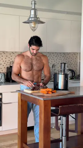 While I occasionally juice Carrots and Beetroot, I always prioritize eating whole fruits or vegetables, whether they’re raw or cooked. Here’s what the experts say: Juicing fruits and vegetables removes most of the fiber, which is crucial for digestion, regulating blood sugar, and promoting satiety. This leads to quicker sugar absorption from juice, potentially causing blood sugar spikes, whereas eating them raw provides a slower, more balanced energy release due to the fiber content.  Additionally, juicing can result in higher calorie intake since more fruits and veggies are needed to make a single glass, while the fiber and water content in raw foods help with fullness and portion control. Raw fruits and vegetables also support better digestive health and provide more antioxidants and phytochemicals, especially from the skins and fibrous parts, which are lost during juicing. While juicing offers a quick way to increase nutrient intake, raw produce provides more long-term health benefits, including better satiety, more complete nutrition, and slower sugar absorption. . . . . . . . . . . . . #veganrecipes #juice #menchef #shirtlessman #veganman #fitvegan