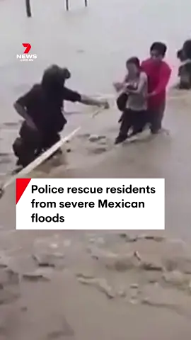 Dramatic video shows the moment members of the Public Security Secretariat of Guerrero in southwestern Mexico used ropes to pull locals to safety across a street flooded by heavy rain as Hurricane John tore through Acapulco. #floods #rain #wildweather #weather #hurricane #HurricaneJohn #Mexico #7NEWS