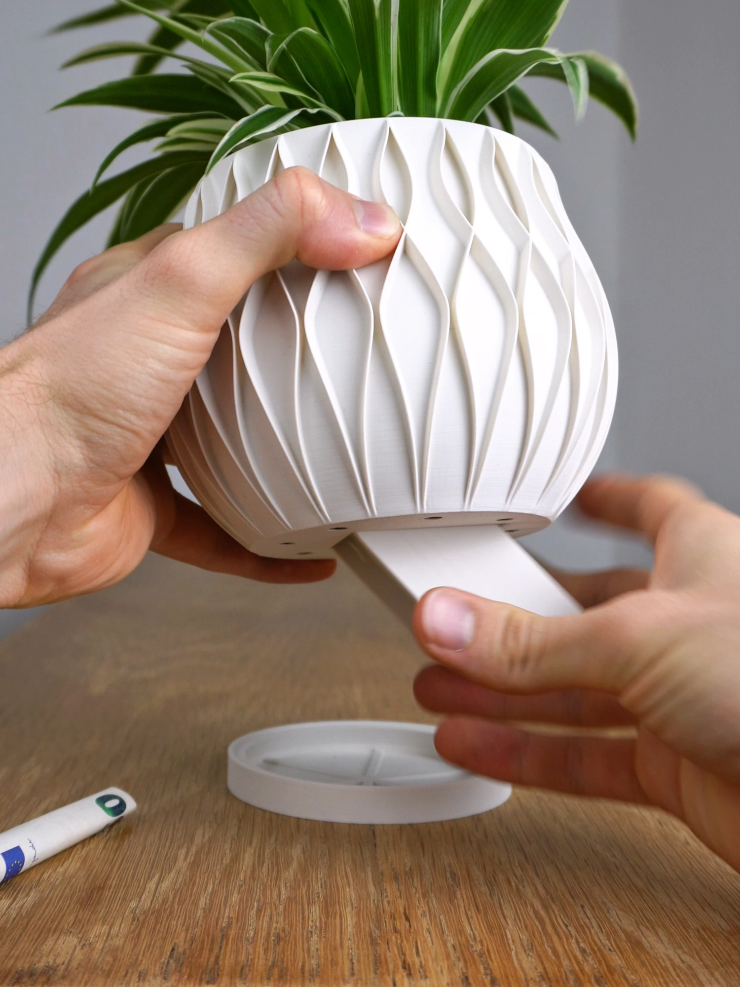 STL files are available here: https://factoriandesigns.com   This planter is a creation where 3D printing truly shines. Hollow structures, intricate shapes, and a unique hiding mechanism for your valuable items—all achieved with just two easy prints. What would you hide in your secret planter safe?  Link to all files in my bio!  I ensured that the push-lock, push-release mechanism works with both PLA and PETG for long-term use without permanent bending.   This was a tough engineering challenge, but I am very proud of how it turned out. I hope you enjoy using it as much as I do. #3dprinting #3dprint #planter