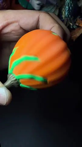 3D-Printed Passthrough Pumpkin Spinner. 📁File: Makerworld 🖨️Printer: @BambulabGlobal P1S AMS Filament: @bambulab_official PLA Green, Orange, Gold. #asmr #3dprinting #toy #fidget #spinner #passthrough #pumpkin 