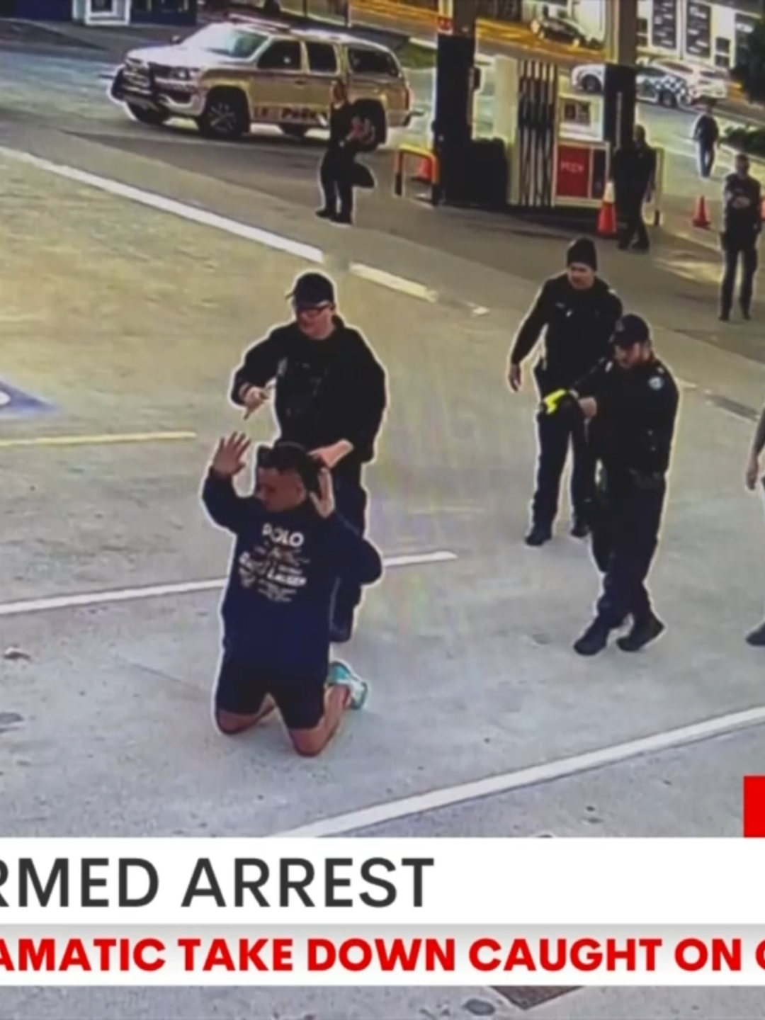 7NEWS has video of a man's dramatic arrest after a three-hour-long standoff with armed police at a Gold Coast petrol station. Security cameras captured the moment he surrendered and was surrounded by officers with their guns drawn. #7NEWS