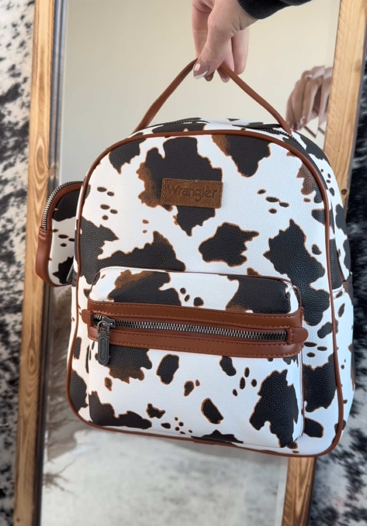 Full Size Wrangler Cow Print Backpack #backpack #wrangler #cowprint #westernfashion #falldealsforyou #punchy #country #handbag #westernhandbag 