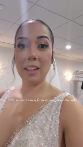Minutes before walking down the aisle. I recommend every bride to take a moment to herself before the big moment. #walkingdown #bridetobe #weddingdress #weddingtiktok #bridetok #nycwedding 