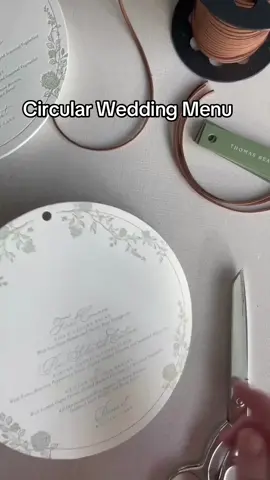 Phillip and Elizabeth’s wedding menus brought an elegant, personal touch to their celebration on the family’s private property. The circular menus, letterpress printed in green, featured delicate, trailing florals that perfectly complemented the setting. Each guest’s place card was tied with a leather cord, adding a rustic yet refined detail. A perfect blend of sophistication and natural charm! . #weddingstationery #luxurystationery #stationery #customstationery #weddingdetails #menu #weddingmenu #placecards #weddingplacecards #graphicdesign #graphicdesigner 