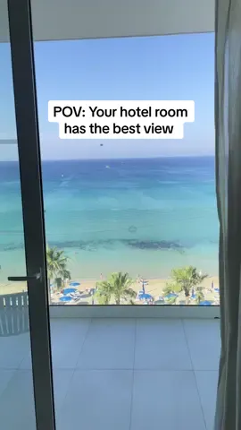 POV: Your hotel room has the best view 🌴🐚🌊💙 Constantinos The Great Beach Hotel is an all inclusive hotel right on the beach in Protaras ✨ #hotelview #allinclusiveresort #allinclusive #hotelroom #holidaytiktok #traveltiktok #travel #fyp #seaview 