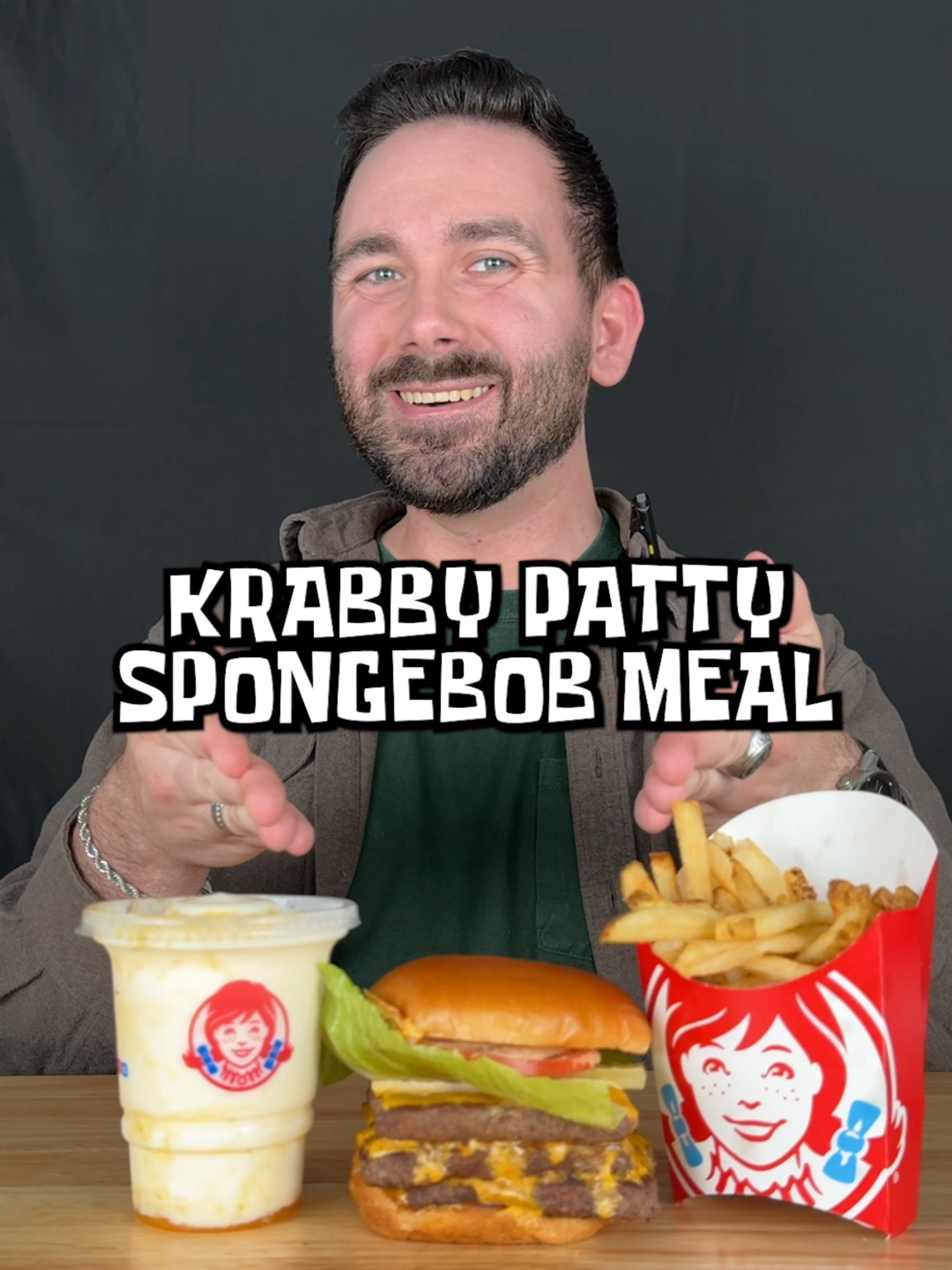 Krabby Patty SpongeBob Meal Reviewing Wendy's Spongebob Kollab Meal. This includes a Krabby Patty Burger, Pineapple Under the Sea Frosty, and Fries. #krabbypatty #wendys #fastfood #foodreview #newfood