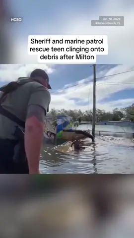 A Hillsboro County Sheriff and a special marine unit on patrol in #Hillsboro Beach, #Florida spotted a teenage boy clinging onto debris in floodwaters after Hurricane #Milton devastated the area, quickly rescuing him.