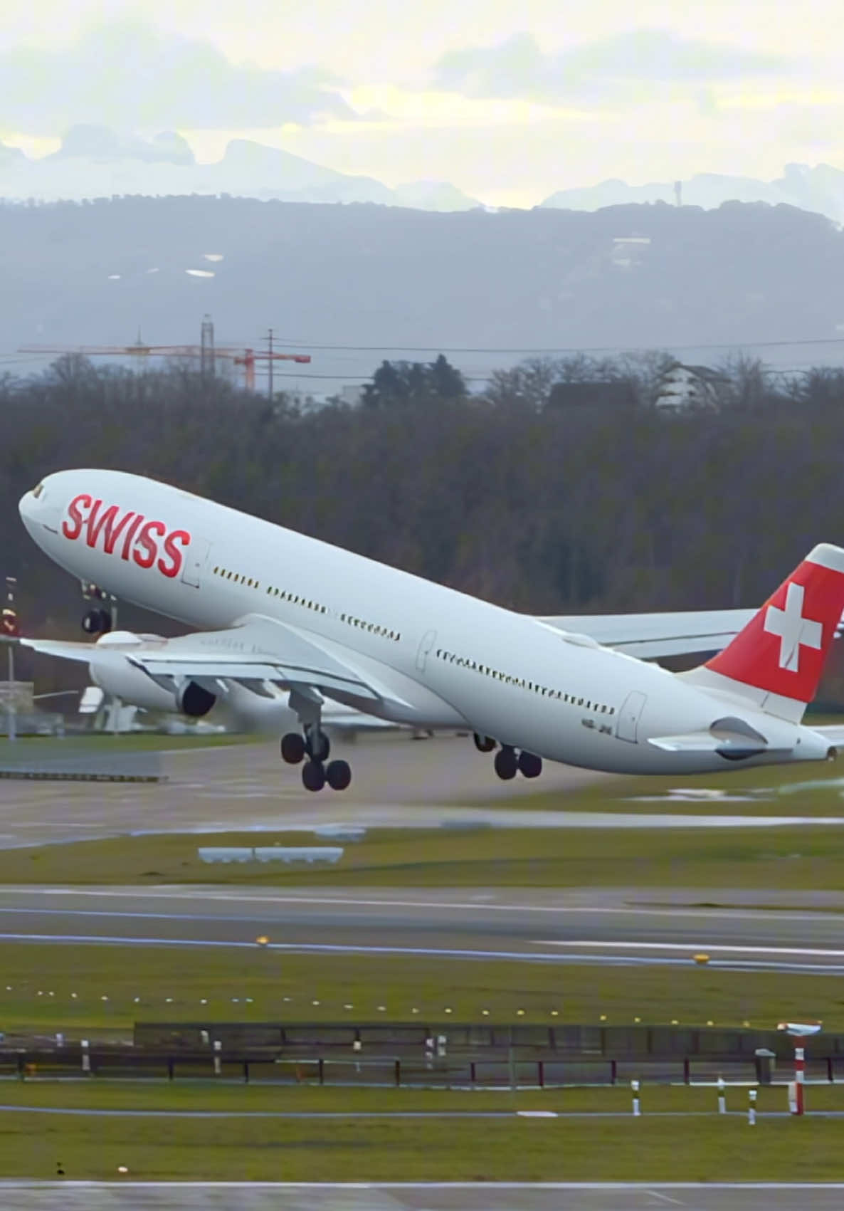 SWISS Airbus A330 departs a chilly Zurich for New York #airbus #aviation #takeoff #a330 #swiss #avgeek #flying #pilot #foryou #travel #Runway 