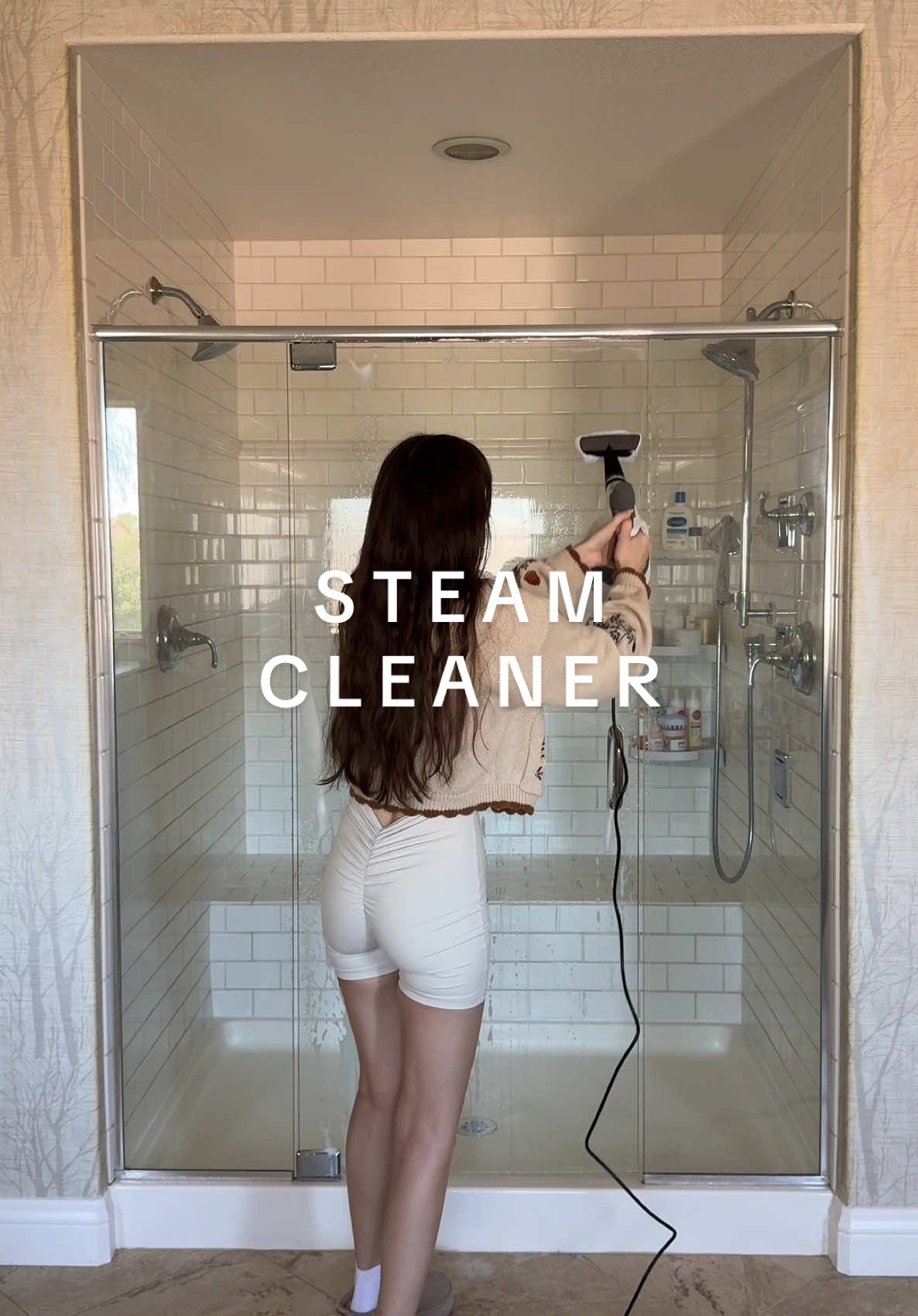 this needed a steam😬 steamer above👆   #cleanwithme #satisfyingvideo #showercleaning #steamcleaner #steamcleaning #sundayreset #howtodeepcleanshower #cleanshowerglassdoors #bathroomshowerhacks #howtocleanbathroomglassdoor #aestheticbathroom #cleanhouse #sundaycleaning #hauntedhomefinds #toptieroctober #cozycountdown #creatorsearchinsights #tiktokshopblackfriday #tiktokshopcybermonday    This white handheld steam cleaner comes with 12 pieces. It’s handheld and corded. I do like how many different attachments are included! The only thing missing is a window to see the water fill line. It bugs me when steamers don’t have that viewable. However, the cup that comes with it has the exact measuremnts for filling it up. It does last quite awhile before needing to be refilled, which is nice. After my first deep clean with it, I’m kind of obessesed with finding some more things to steam!  