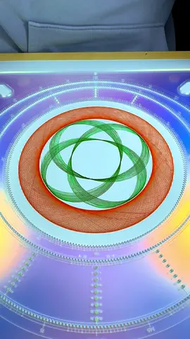 “Spirographic Universe: A Burst of Green and Orange in Perfect Symmetry” #spirographshr #asmr #art #viral #satisfying #spirograph #pattern #foryou #usa #amazing 
