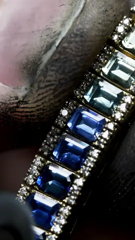 Enjoy the full process of how i made the newest rainbow bracelet. Welcome to MDTC Jewelry.@mdtc_jewelry_official I’m XILING @mdtc_jewelry_official  the founder and master craftsman. I’m excited to introduce my latest creation: a handcrafted Rainbow Bracelet. This piece has been a month-long labor of love, from carefully selecting the perfect gemstones to crafting the setting by hand. The Rainbow Bracelet is inspired by the vibrant hues of a rainbow. It’s meticulously made with 18-carat yellow gold and showcases stunning Princess-cut sapphires. These aren’t just any ordinary stones. Each sapphire was handpicked to transition gracefully through a spectrum of colors—from orange and pink to purple, blue, and green—creating a captivating rainbow effect. To elevate the brilliance even further, the bracelet is accented with natural diamonds that enhance the beauty of the central gemstones. The rainbow symbolizes a love that is both sweet and full of joy. While it makes a perfect wedding piece, it’s also an exceptional anniversary gift, celebrating your unique love story. Take a moment to enjoy the process behind crafting this Rainbow Bracelet. If you’re dreaming of a custom-made piece like this, leave a comment and follow me. Let’s create something truly one-of-a-kind together! #mdtcjewelry  #craftsmanship  #rainbowjewelry  #bracelets  #custommade 