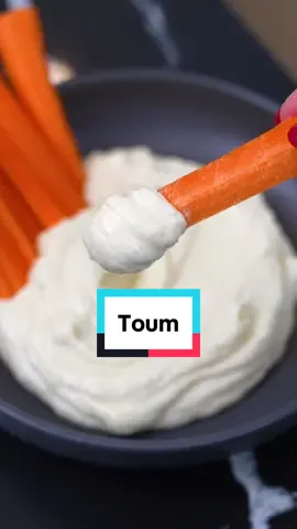 How to make garlic dip AKA Toum 🧄 ⬇️ I always eat raw garlic when it is cold and flew season and I swear by it helping me stay healthy. Raw garlic has been known to help fight off colds and flus, and I am no doctor, but it seems to work for me. Instead of eating just cloves (ew) I make toum! Which is a Mediterranean garlic sauce / spread. I even add a scoop of @ISopure  Unflavored Protein Powder for added protein and nutrients that you cannot even taste in this recipe. Ingredients: 1. 1 cup garlic cloves 2. 1/2 cup freshly squeezed lemon juice 3. Pinch of salt 4. 2-3 cups avocado oil 5. 1 scoop @Isopure Unflavored Protein Powder Instructions: 1. Using an immersion blender, blender or food processor, blend the garlic, salt and lemon juice until smooth-ish. 2. While blending, slowly add the avocado oil to emulsify. Add until thickened and creamy.  3. Blend in the Isopure Unflavored Protein Powder until smooth. 4. Serve and enjoy! ***Store in a container in the fridge for up to 3 weeks. Check out the below link to get Isopure Protein Powder for this delicious recipe!  https://www.theisopurecompany.com/en-us #ad #IsopurePartner #toum #HighProtein #garlicdip 