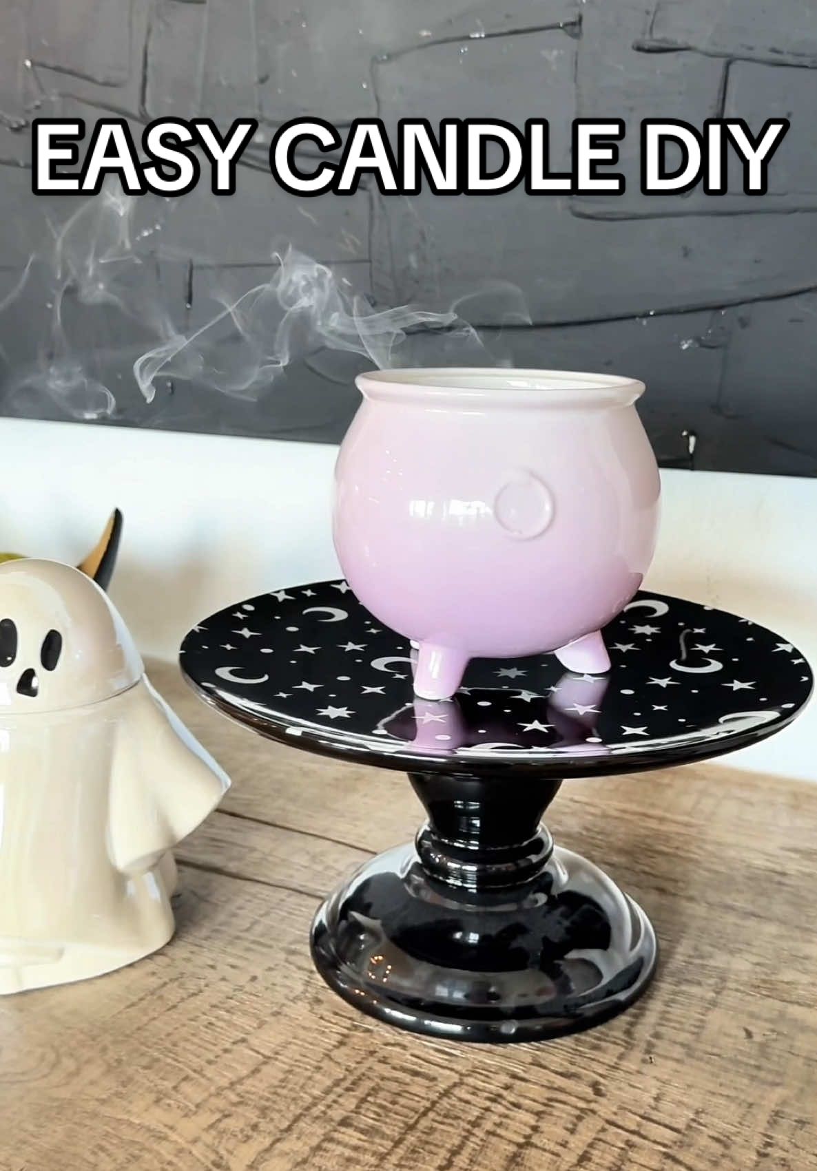 A trip to Target fixes everything! This candle DIY is so easy and only cost $5! #halloweendecor #diyhalloween #diycandle #candlemaking 