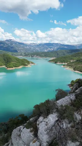 Drone Views of Lake Bovilla & Gamti Mountain - Albania 🇦🇱 September 2024 ➡️ Book your day tour to both of these attractions with Dream Tours Albania if you’re staying in Tirana. 💯 That’s what we did and we thoroughly enjoyed it. Shoutout to our tour guide, Orlanda, and our driver, Ferit, for doing an excellent job making sure we had an enjoyable and safe tour.  🌊 Bovilla Lake is a reservoir in Albania, approximately 9 miles northeast of Tirana and southeast of Kruja, within Dajta Mountain National Park. It provides most of the drinking water for Tirana.  ⛰️ Mt. Gamti is the lakeside mountain next to Lake Bovilla and is considered one of the most picturesque hikes near Tirana.  🥾🍽️ The hike up to Gamti Mountain was a bit tough but worth it for the views. The restaurant we stopped at for lunch after the hike down was decent.  🏊‍♂️ Finally, Lake Bovilla was so beautiful with its vibrant turquoise color. After lunch, the group went for a short swim in the lake while I sent my drone flying to capture the nice views seen in this video.  🚐 Our tour guide and driver picked us all up from our respective pick up spots between 8:45 and 9:45 am to start the tour and they had us all back in Tirana by around 4:30 pm so the tour lasts about 7 to 8 hours depending on traffic. 🔗 DM me or comment - Link - in the comments below and the direct TripAdvisor booking link for this exact tour shall be sent to you👌 #bovillalake #albania #albanian #tirana #tiranaalbania #drone #dronevideo 