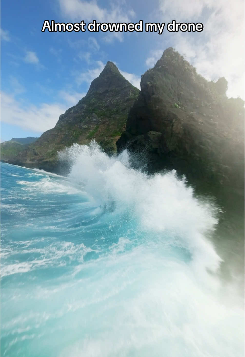 Wave almost took my drone 🌊😰  The colors are a bit off because the filter fogged up, but I had to share this shot. That wave was massive, and I didn’t expect it to splash like that 😂 Would you have flown through?