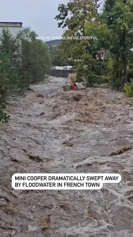 Torrential rain caused some severe flooding in the south of France on October 17, with shocking footage showing a Mini Cooper being swept off by a raging flow of muddy water. Nicolas Chatillon recorded this video in Saint-Marcel-les-Annonay, near Saint-Etienne. In the footage, the car can be seen being violently dragged by the stream and Chatillon saying, “Look at that car!” Chatillon told Storyful that water had flooded his property after the heavy downpour, but that the situation was thankfully rapidly fixed. Six departments were on red flood alert, and 19 on orange flood alert, local media reported. The mayor of the nearby commune of Annonay asked residents to stay home and follow instructions, saying the situation was “extremely critical.