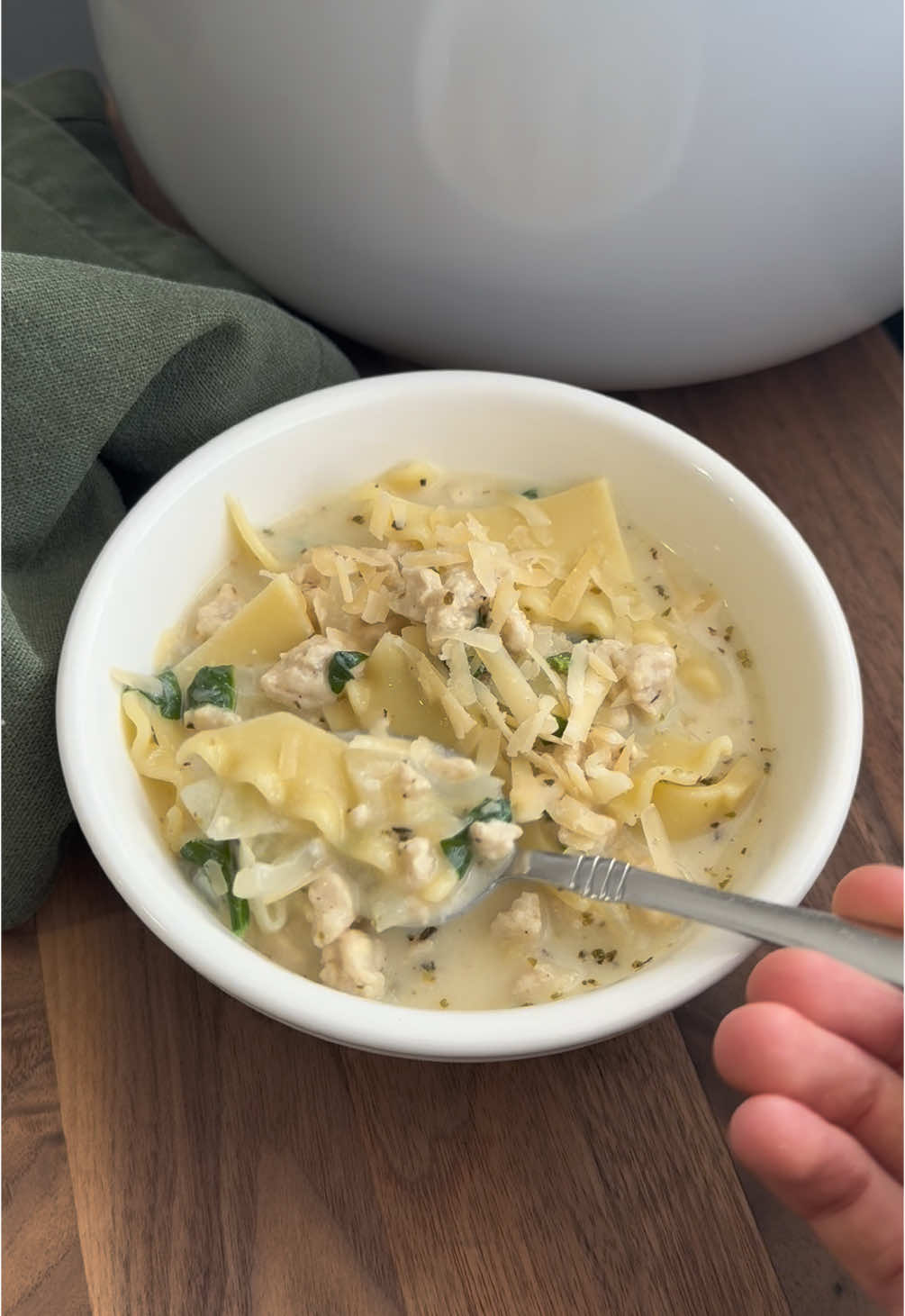 HIGH PROTEIN WHITE LASAGNA SOUP 🤍🍜 38g of protein for this cheesy, cozy, comforting bowl of goodness. Ingredients: 1 lb 99% lean ground turkey salt and pepper, to taste 1 tbsp butter (14 g) 1 tbsp flour (8 g) 1 small yellow onion (200 g) diced 2 cloves garlic, minced 2 tsp Italian seasoning 4 cups chicken broth (960 ml) I use reduced sodium 1 cup whole milk (240 ml) 6 sheets lasagna noodles (150 g) 2 1/2 cups spinach (75 g) roughly chopped 3 oz mozzarella cheese (84 g) fresh grated, about 1 cup 2 oz parmesan cheese (56 g) fresh grated, about 3/4 cup (accidentally didn’t video adding it) 1-2 tsp hot sauce, optional but highly recommended Instructions: 1. Heat a large pot on medium high heat, spray with a little oil or cooking spray and add the turkey. Cook turkey, breaking apart into small pieces, until fully cooked. Season with salt and pepper (I typically do 1 tsp salt and 1/2 tsp pepper). Remove from heat and set aside. 2. In the same pot, melt the butter and add the flour. Stir together, cooking for 1-2 minutes. Add the diced onion and cook for a couple more minutes, until onions are soft and fragrant. Add minced garlic and Italian seasonings, cooking for 1 more minute. 3. Pour in the chicken broth and milk and add back in the cooked turkey. Bring soup to a gentle boil. 4. While you’re waiting for the soup to reach a boil, break apart the lasagna sheets into smaller pieces. Once boiling, add the lasagna pieces, and cook 8 minutes or according to box instructions, stirring often. Remove from heat. 5. Add in the chopped spinach, mozzarella, parmesan and hot sauce and stir together. Taste the soup and add any more salt if needed. Serve with more parmesan, if desired, and enjoy! For full printable recipe + tips + nutrition, search “white lasagna soup” at the 🔗 in my bio or at myproteinpantry.com ✨ and be sure to follow along for more easy high protein recipes 👩🏻‍🍳 #highprotein #EasyRecipes #healthyfood #healthylifestyle #healthyrecipes #dinner #easydinner #lasagna #soup #macrofriendly #macrofriendlyrecipes