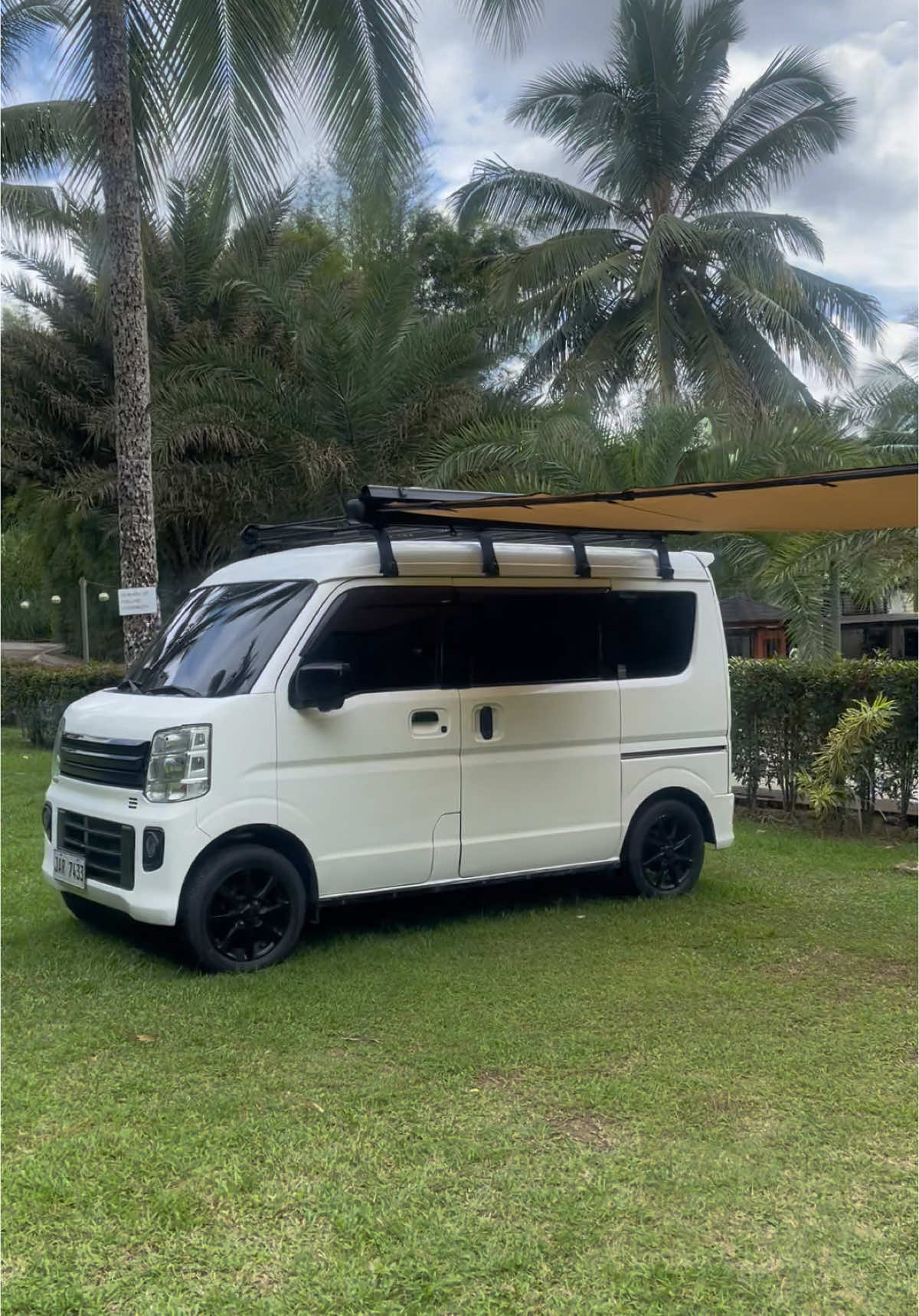 Minivan with awning tent! #minivanlife #minivan #campervanlife #camper #everywagon #DA17W #minicamper #suzukievery #fyp 