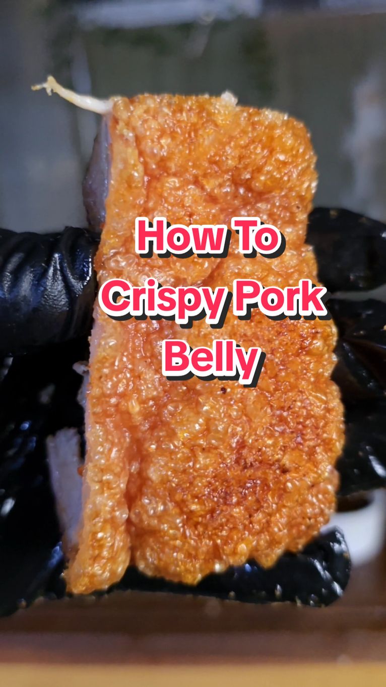 Replying to @doublek079  Crispy Pork Belly Masterclass 😍🔥 Get ready to make the crispiest pork belly ever, with a golden crackling that'll shatter in every bite! Follow these steps to make it happen. Any questions? Hit me up in the comments 🐽 Pork Belly @lugarnogourmetmeats butcher 🧂 Garlic Goals & Steak Shooter @lownslowbasics 🔪 Neon Series MK3 Chefs Knife @chefsupplyco THE DETAIL👇 Drying the Skin: The #1 rule for crispy crackling is DRY skin. This is where most people go wrong. I usually let mine dry in the fridge for up to 4 days (I do NOT salt the skin when drying the pork in the fridge), but here's a shortcut: head to your butcher! Many butchers hang pork belly or pigs in their cool rooms, which dries out the skin for you. If you don’t want to wait days for the skin to dry, your butcher is your best friend!  Scoring vs. Not Scoring: I don’t score my pork belly skin, and here’s why. People say scoring helps render the fat, but I call BS! The fat will render if you cook it hot and long enough. If you want an eruption of crunch, prick tiny holes in the skin with a jaccard (or the tip of a sharp knife). This can be done the same day you're cooking, and it works wonders! Salt-Baked Pork Skin: This method, common in Asian-style pork, is a game changer. I cover the pork skin with rock salt to extract moisture. Don’t worry, you won’t taste the salt! But if you score the skin and use this method, it will turn out salty. Cooking Times & Temps: Oven at 180°C for 60 minutes, middle shelf. Remove the salt, then brush the skin with 1/2 tbsp of white vinegar. The vinegar aerates the skin for a light, crunchy texture. Back in the oven at 250°C, bottom rack which is the furthest away from the heat, for 20-30 minutes or until golden. Final Touches: Rest your pork for 10 minutes before slicing. That’s it! Crispy, golden perfection. Ready to give it a go? Let me know in the comments if you’ve got any questions or if you try this method out! 👨‍🍳👩‍🍳 #porkbelly #crispypork #crispyporkbelly  #porkrecipes #porklovers 