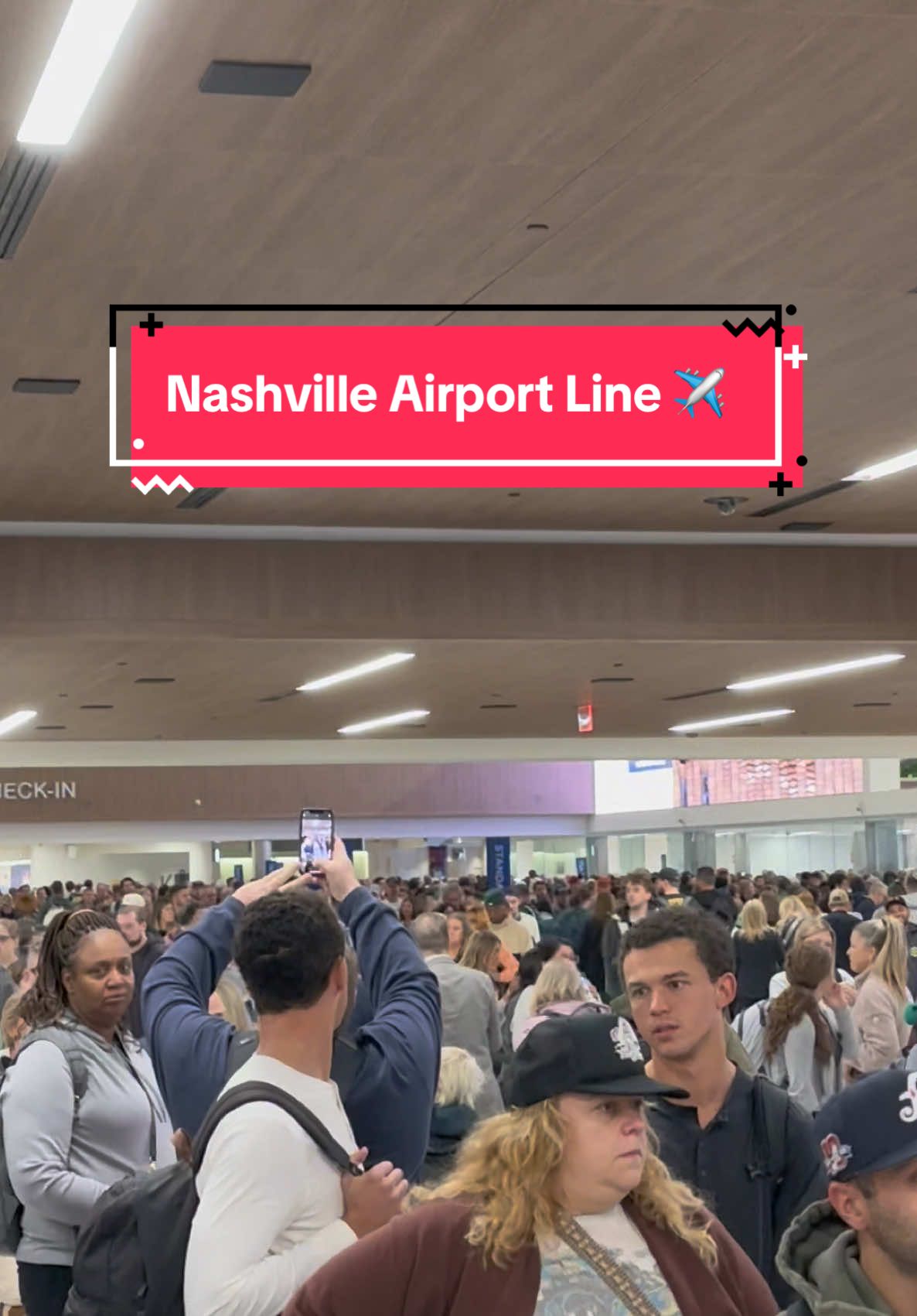 ✈️ The securtiy line at BNA Nashville airport is about 3000 deep going all the way down the hall.  #bna #nashville #postmalone #traveltiktok #travel #travelagent 